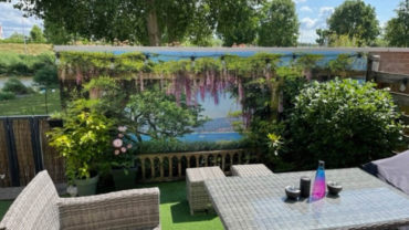Natuurlijke pracht en persoonlijkheid: Tuinposters als Tuindecoratie